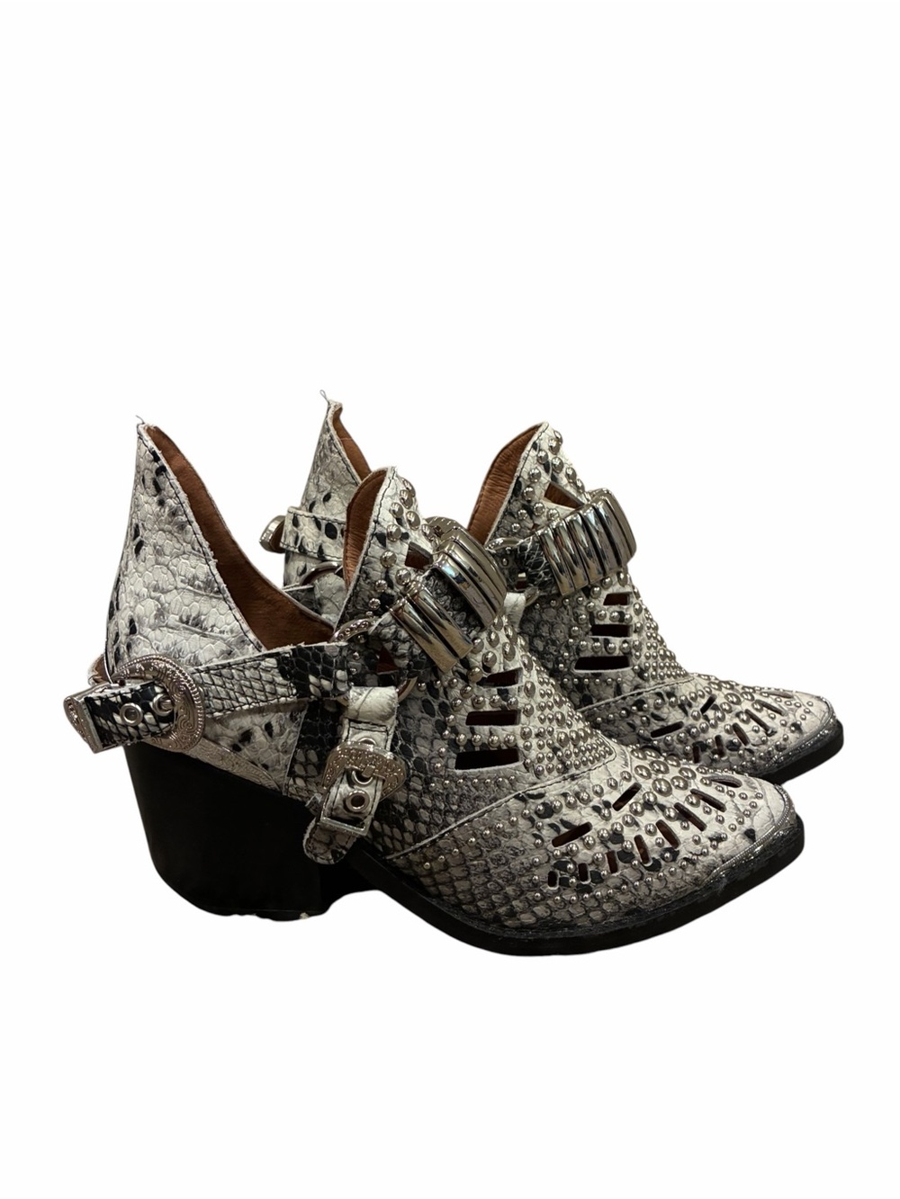 Jeffrey Campbell Calhoun Cutout Bootie covered in elaborate silver studs buckle